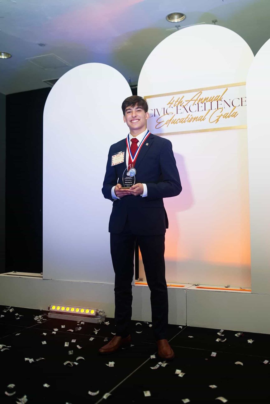 Receiving an award at the 4th Annual Civic Excellence Educational Gala
