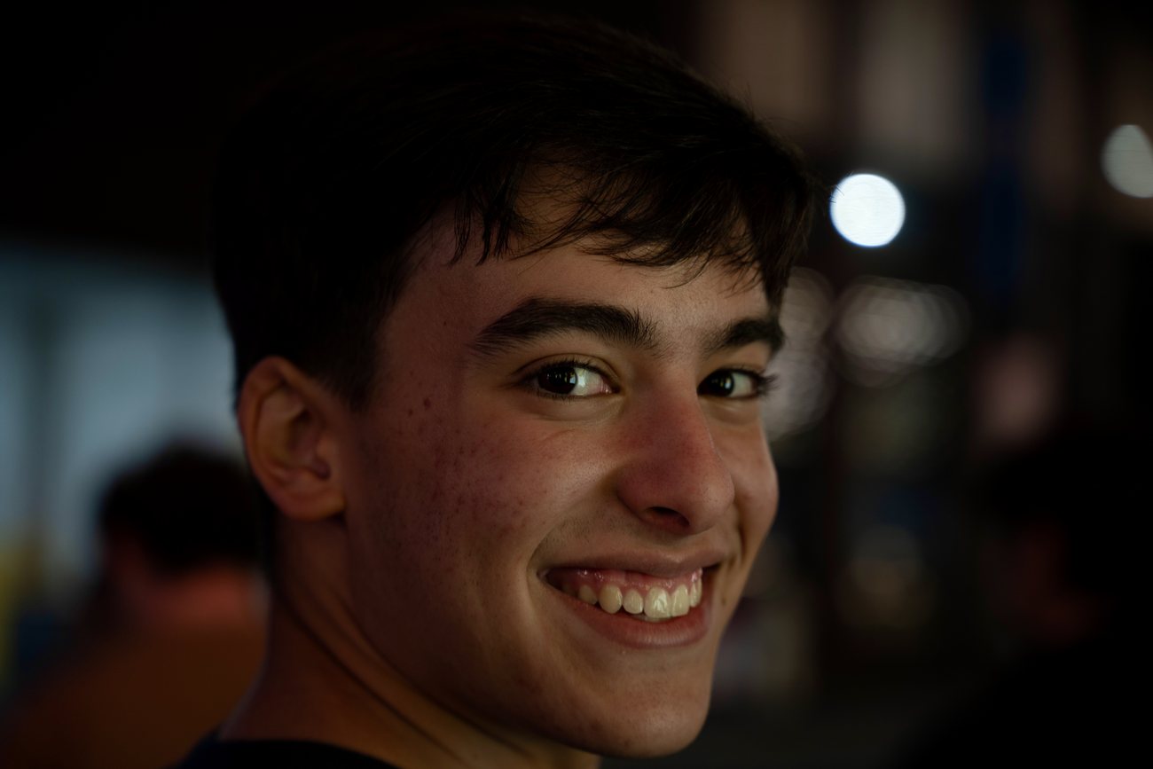 Portrait, smiling over his shoulder