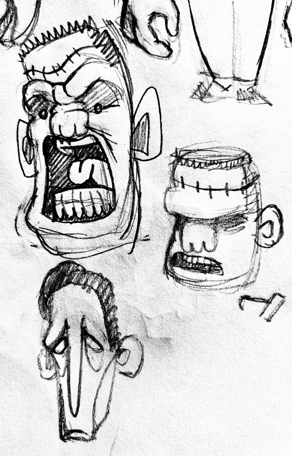 Pencil sketches of Frank's head and expressions